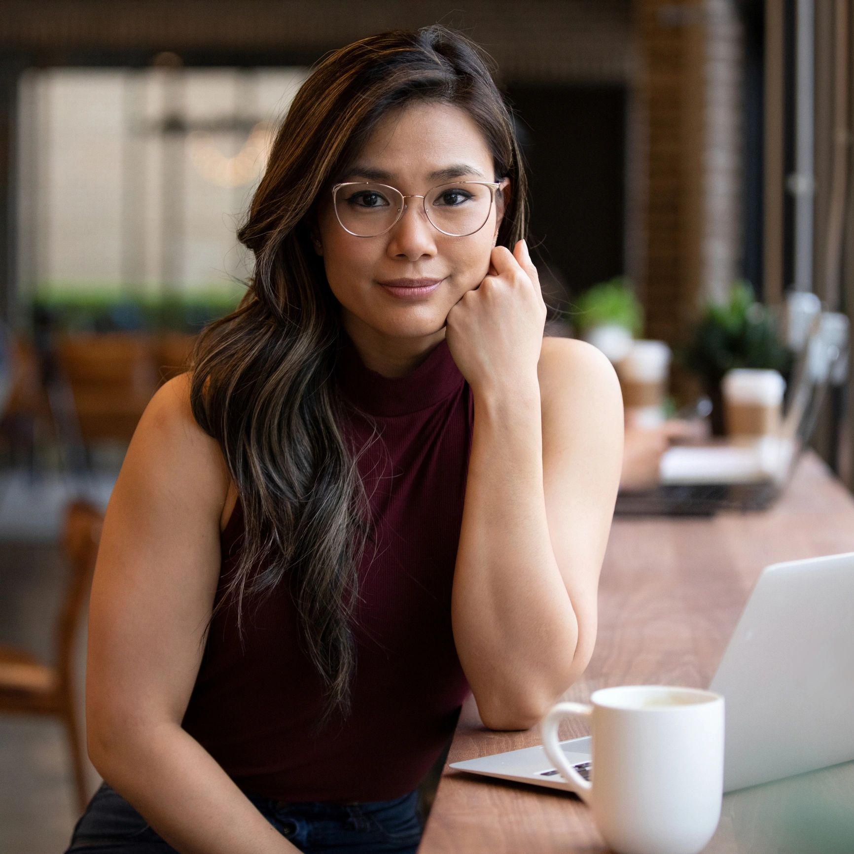 Team member portrait in a casual workspace