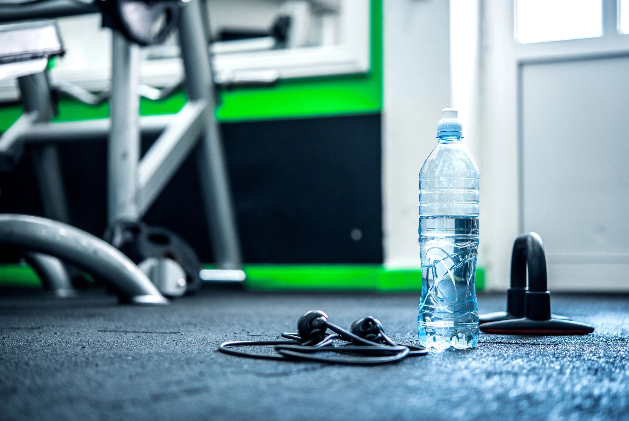 Gym equipment background representing security and operational systems